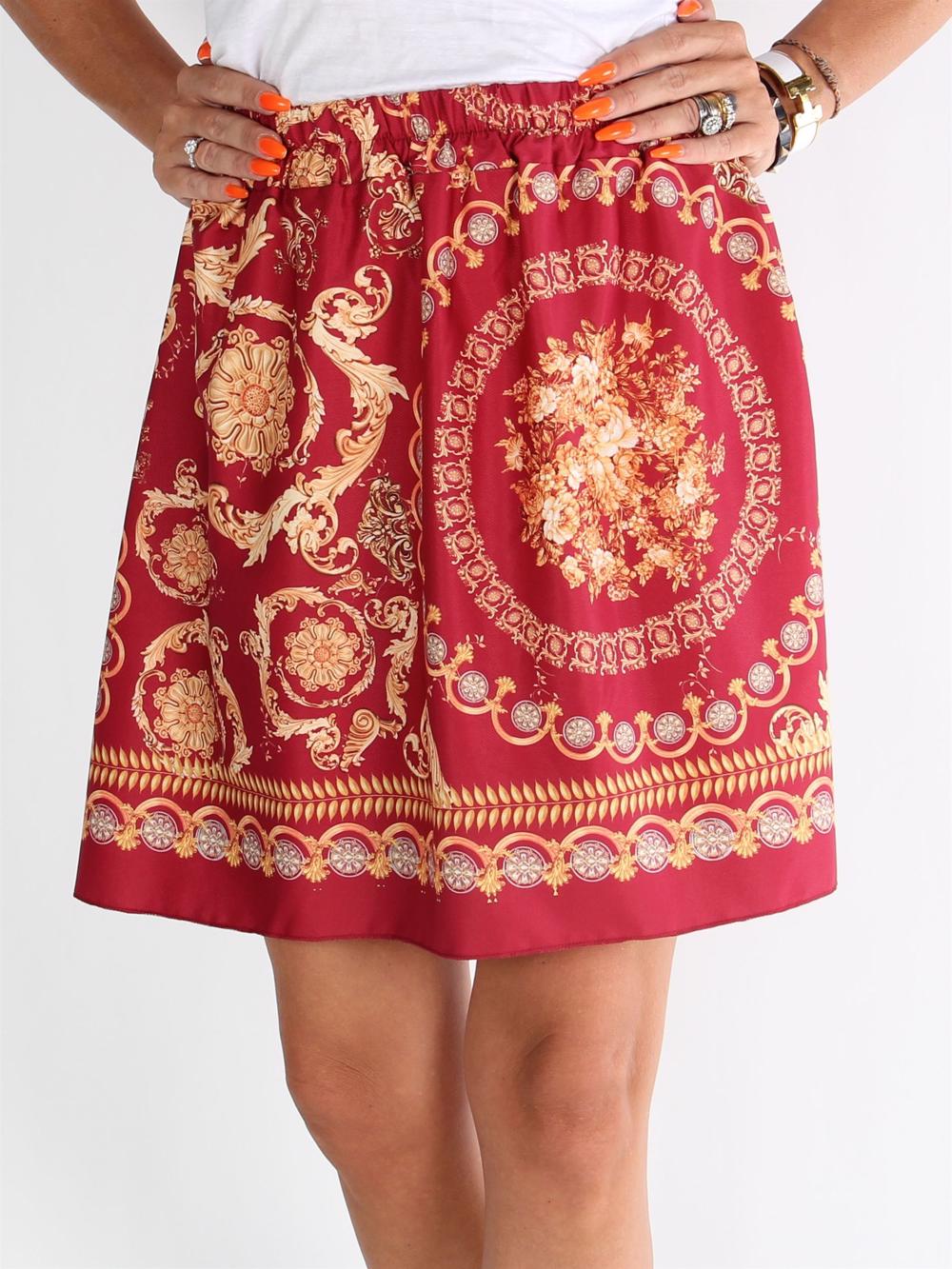 Kesia - Sort nederdel med fine motiver i varme nuancer